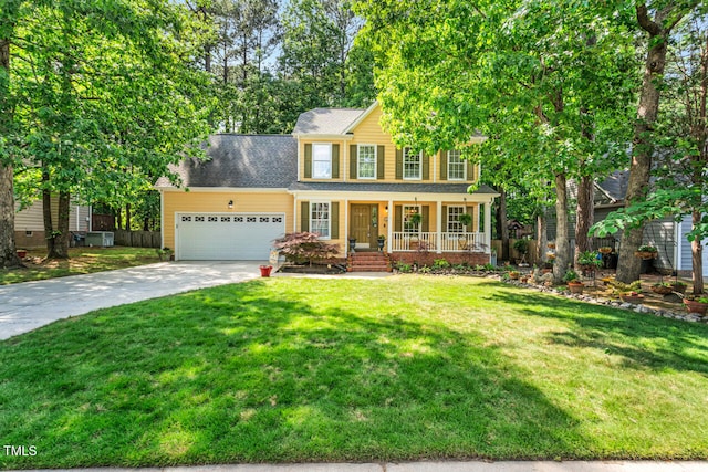 11 Bridgeport Dr, Durham, NC 27713 - traditional home with covered porch, driveway, a front yard, and a garage