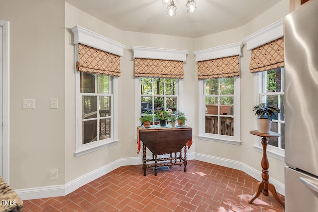 11 Bridgeport Dr, Durham, NC 27713 - sitting room featuring a healthy amount of sunlight and brick floor