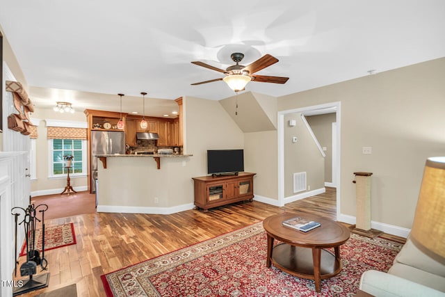 11 Bridgeport Dr, Durham, NC 27713 - living area with baseboards, ceiling fan, light wood-type flooring, and visible vents