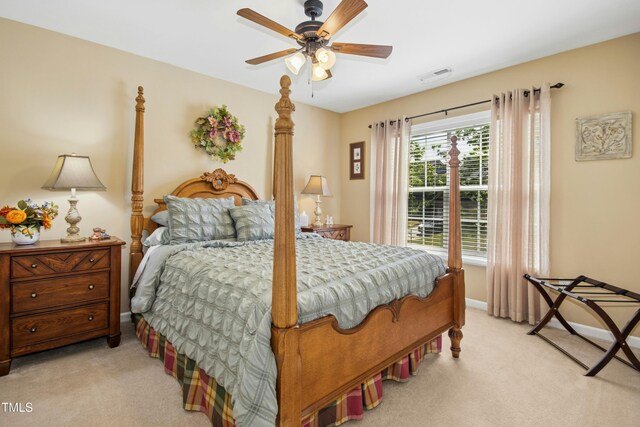 bedroom with visible vents, carpet, ceiling fan, and baseboards