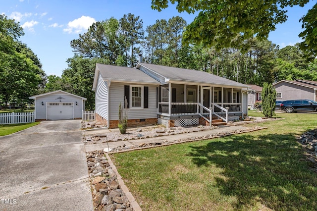 view of front of property with crawl space, an outbuilding, a garage, a front lawn, and concrete driveway