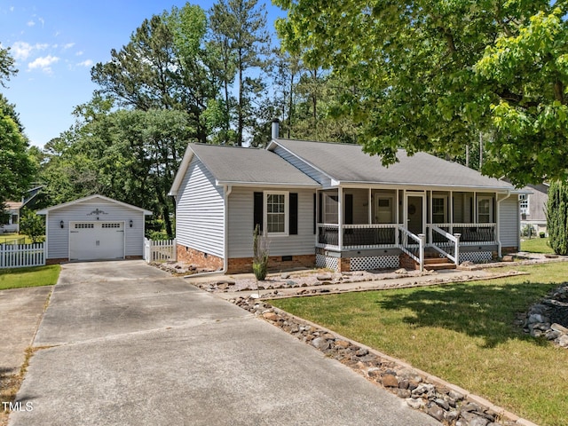 ranch-style home featuring a porch, crawl space, driveway, an outbuilding, and a garage