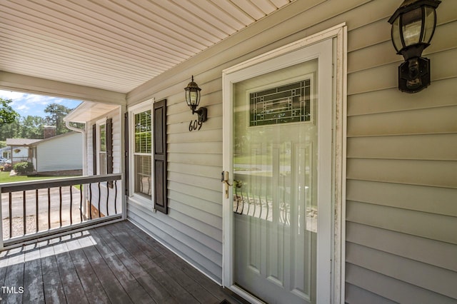 doorway to property with a porch