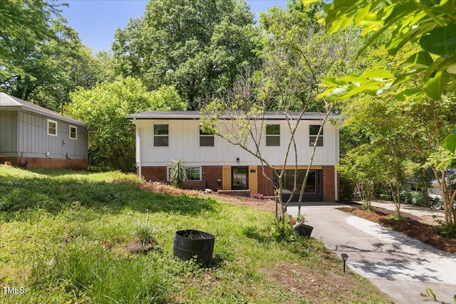 2904 Sprucewood Dr, Durham, NC 27707 - view of front of home featuring brick siding and driveway