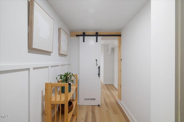 2904 Sprucewood Dr, Durham, NC 27707 - corridor with baseboards, visible vents, and light wood finished floors