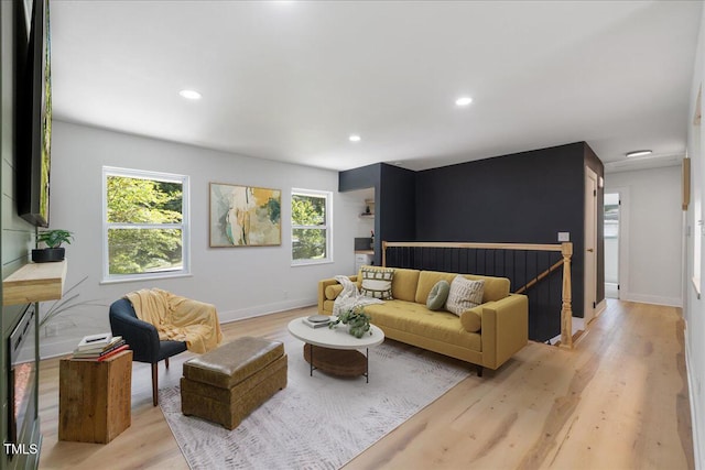 2904 Sprucewood Dr, Durham, NC 27707 - living room featuring baseboards, recessed lighting, light wood-style flooring, and a wealth of natural light