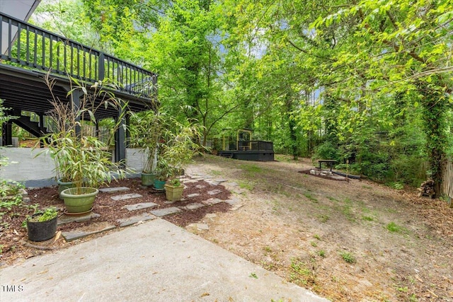 2904 Sprucewood Dr, Durham, NC 27707 - view of yard with a patio and a deck