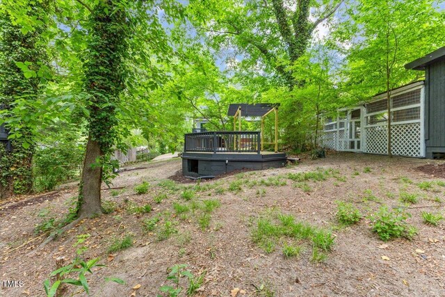 2904 Sprucewood Dr, Durham, NC 27707 - view of yard featuring a deck