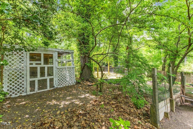 2904 Sprucewood Dr, Durham, NC 27707 - view of yard featuring fence and an outbuilding