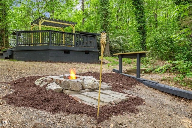 2904 Sprucewood Dr, Durham, NC 27707 - exterior space with a deck, a fire pit, and a pergola
