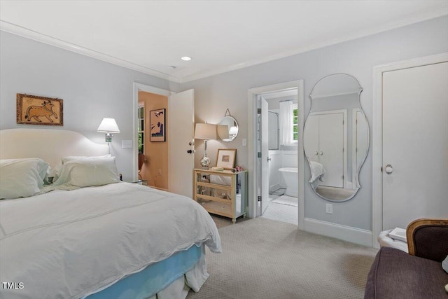 bedroom with crown molding, ensuite bathroom, recessed lighting, and light colored carpet