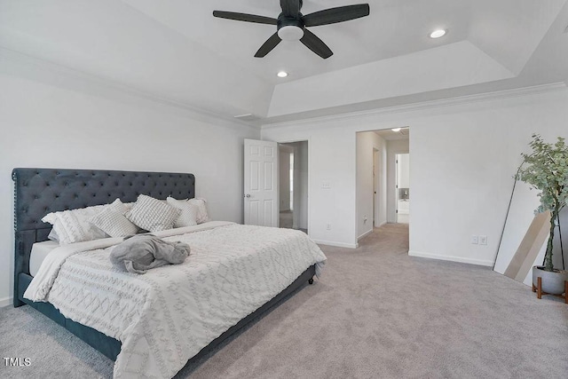 bedroom featuring a tray ceiling, light carpet, ornamental molding, baseboards, and recessed lighting