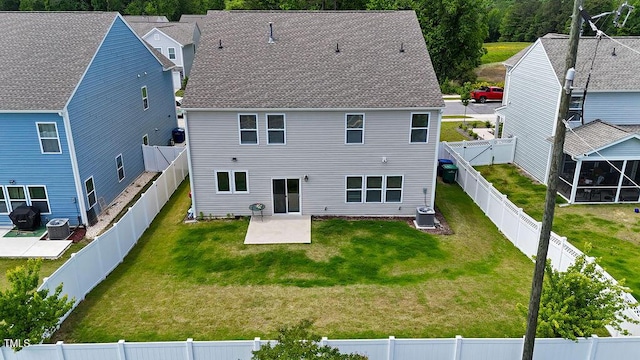back of property with a patio, cooling unit, and a sunroom