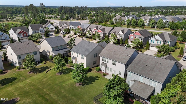 birds eye view of property with a residential view
