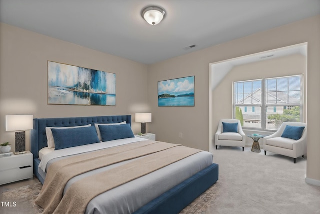 carpeted bedroom with visible vents