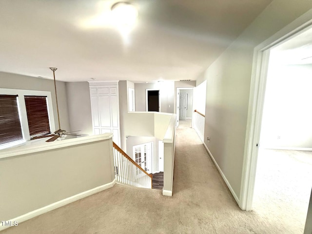 110 Bristolwood Cir, Morrisville, NC 27560 - hall with an upstairs landing, light colored carpet, and baseboards