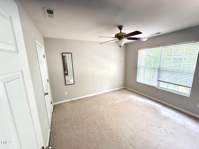 110 Bristolwood Cir, Morrisville, NC 27560 - empty room with a ceiling fan, baseboards, and light carpet