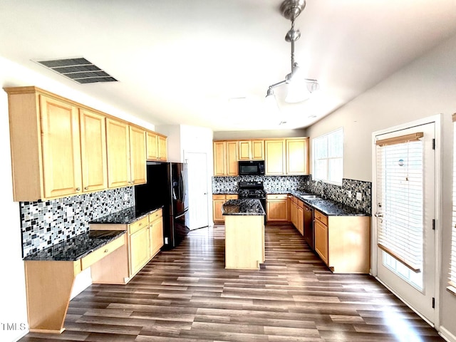 110 Bristolwood Cir, Morrisville, NC 27560 - kitchen with black appliances, a kitchen island, backsplash, and dark wood finished floors