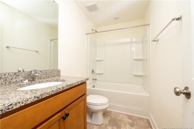 full bathroom with vanity, baseboards, bathtub / shower combination, and toilet