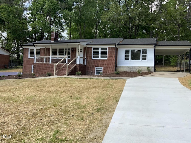 502 Burton St, Fuquay Varina, NC 27526 - ranch-style house with driveway, a front yard, covered porch, an attached carport, and a chimney