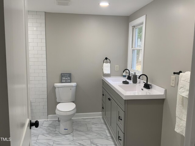 502 Burton St, Fuquay Varina, NC 27526 - full bathroom featuring double vanity, marble look tile flooring, and recessed lighting