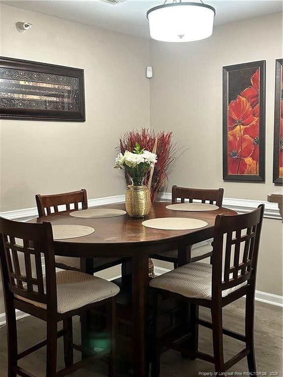dining room with baseboards