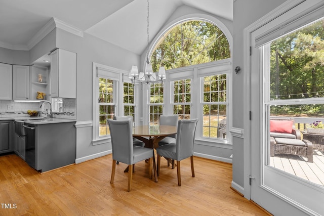 sunroom with an inviting chandelier