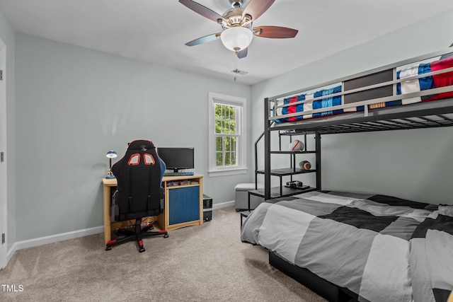 bedroom featuring baseboards, carpet flooring, and ceiling fan