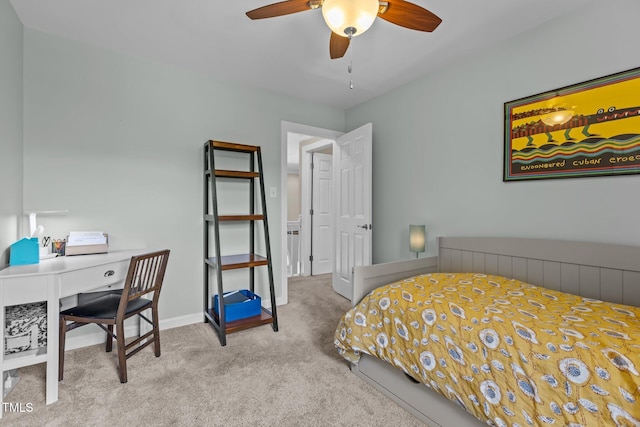 bedroom featuring carpet floors and baseboards