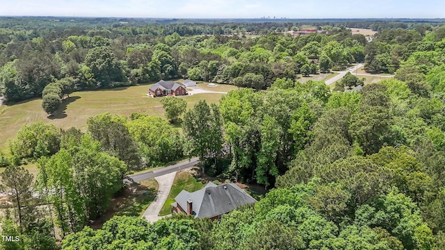 bird's eye view featuring a forest view