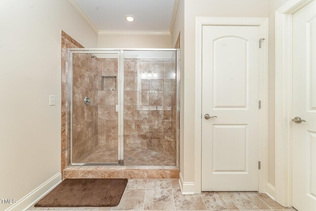106 Jordan Creek Dr, Jamestown, NC 27282 - full bath featuring crown molding, baseboards, a shower stall, and tile patterned floors