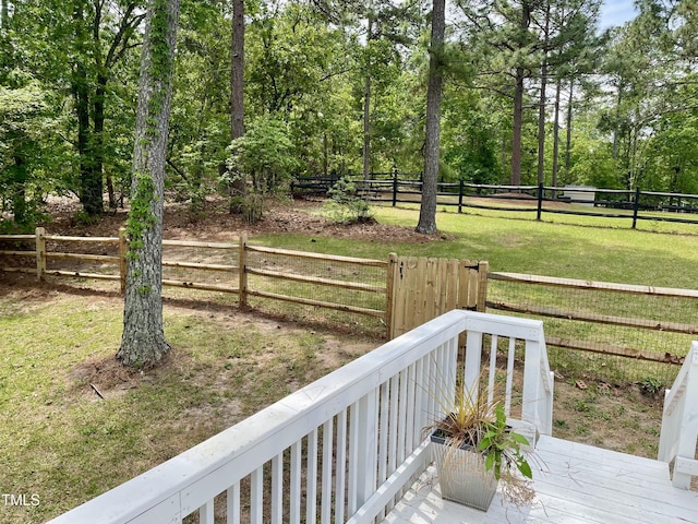 view of yard with fence and a wooden deck