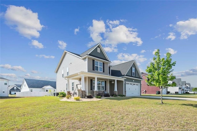 5113 Boxcut Ln, Hope Mills, NC 28348 - craftsman-style house with concrete driveway, a garage, and covered porch