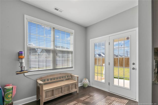 5113 Boxcut Ln, Hope Mills, NC 28348 - doorway with baseboards and dark wood-style floors