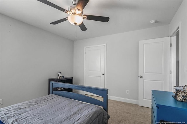5113 Boxcut Ln, Hope Mills, NC 28348 - bedroom with light colored carpet, a ceiling fan, and baseboards