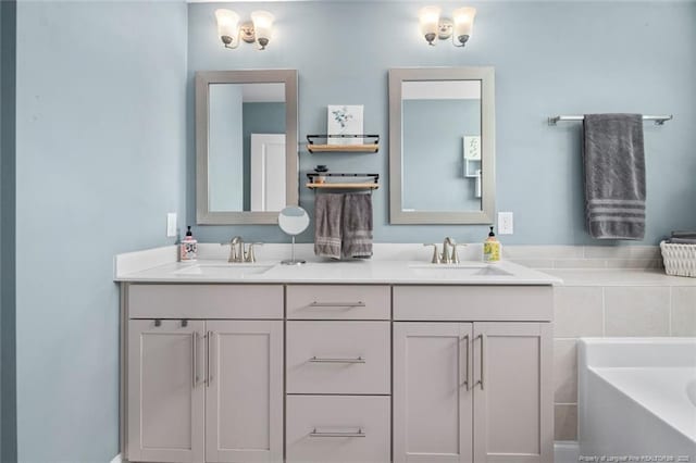 5113 Boxcut Ln, Hope Mills, NC 28348 - full bathroom with double vanity and a bath