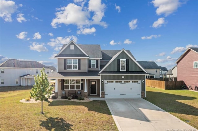 5113 Boxcut Ln, Hope Mills, NC 28348 - craftsman-style home featuring board and batten siding, driveway, an attached garage, and a porch