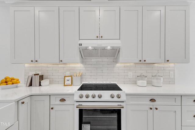 801 N Elm St, Durham, NC 27701 - kitchen with white electric range oven, light stone countertops, white cabinetry, decorative backsplash, and under cabinet range hood