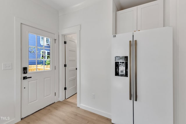 801 N Elm St, Durham, NC 27701 - foyer with light wood-type flooring and baseboards