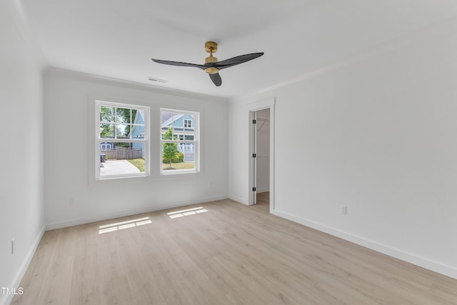 801 N Elm St, Durham, NC 27701 - unfurnished room with baseboards, a ceiling fan, light wood finished floors, and visible vents