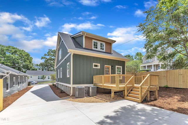 801 N Elm St, Durham, NC 27701 - exterior space with fence, a wooden deck, a shingled roof, board and batten siding, and concrete driveway