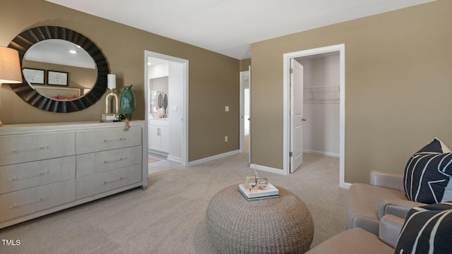 196 Ethel Ln, Angier, NC 27501 - interior space featuring light carpet, baseboards, ensuite bathroom, a spacious closet, and a closet