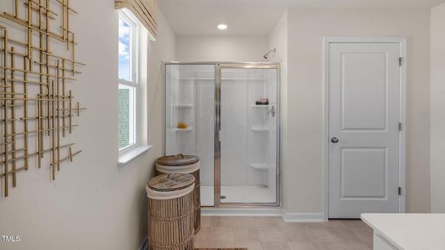 196 Ethel Ln, Angier, NC 27501 - full bath with tile patterned floors, a shower stall, baseboards, and vanity