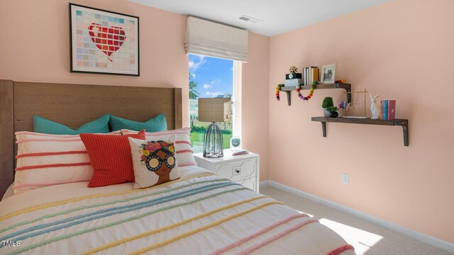 196 Ethel Ln, Angier, NC 27501 - carpeted bedroom featuring baseboards and visible vents