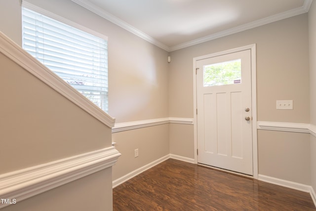 entryway with dark wood-style flooring, baseboards, and ornamental molding