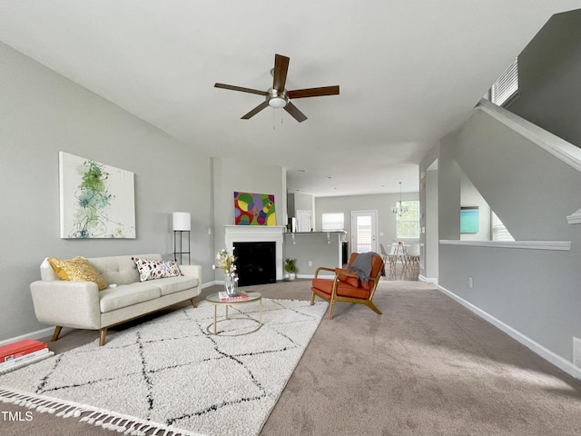 14 Prairie View Ct, Durham, NC 27703 - carpeted living area with ceiling fan, baseboards, and a fireplace