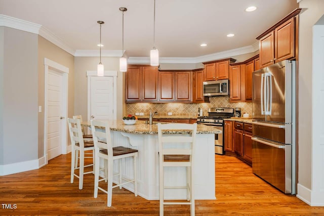 281 N Serenity Hill Cir, Chapel Hill, NC 27516 - kitchen with appliances with stainless steel finishes, light stone countertops, decorative backsplash, light wood-type flooring, and ornamental molding