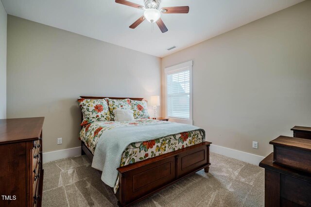 281 N Serenity Hill Cir, Chapel Hill, NC 27516 - carpeted bedroom with baseboards and ceiling fan