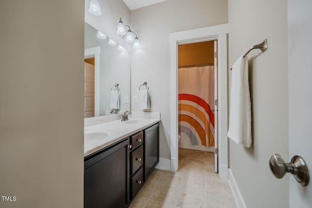 281 N Serenity Hill Cir, Chapel Hill, NC 27516 - bathroom featuring tile patterned flooring, double vanity, baseboards, and a shower with curtain