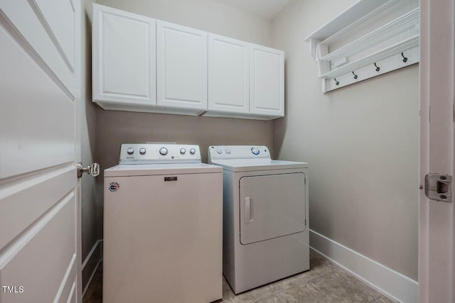 281 N Serenity Hill Cir, Chapel Hill, NC 27516 - washroom with separate washer and dryer, cabinet space, baseboards, and light tile patterned flooring